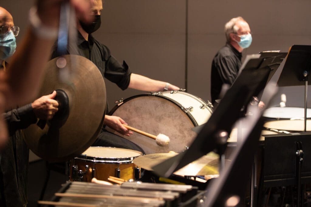 A Group of Men Playing the Drums