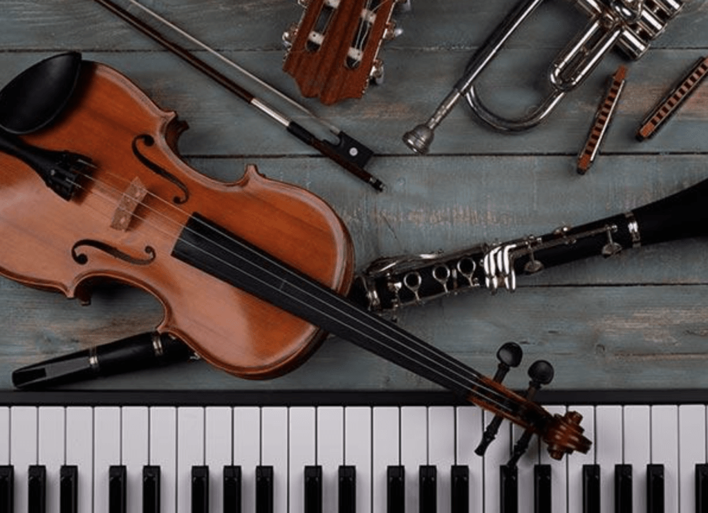 A Bunch of Music Instruments on a Grey Surface